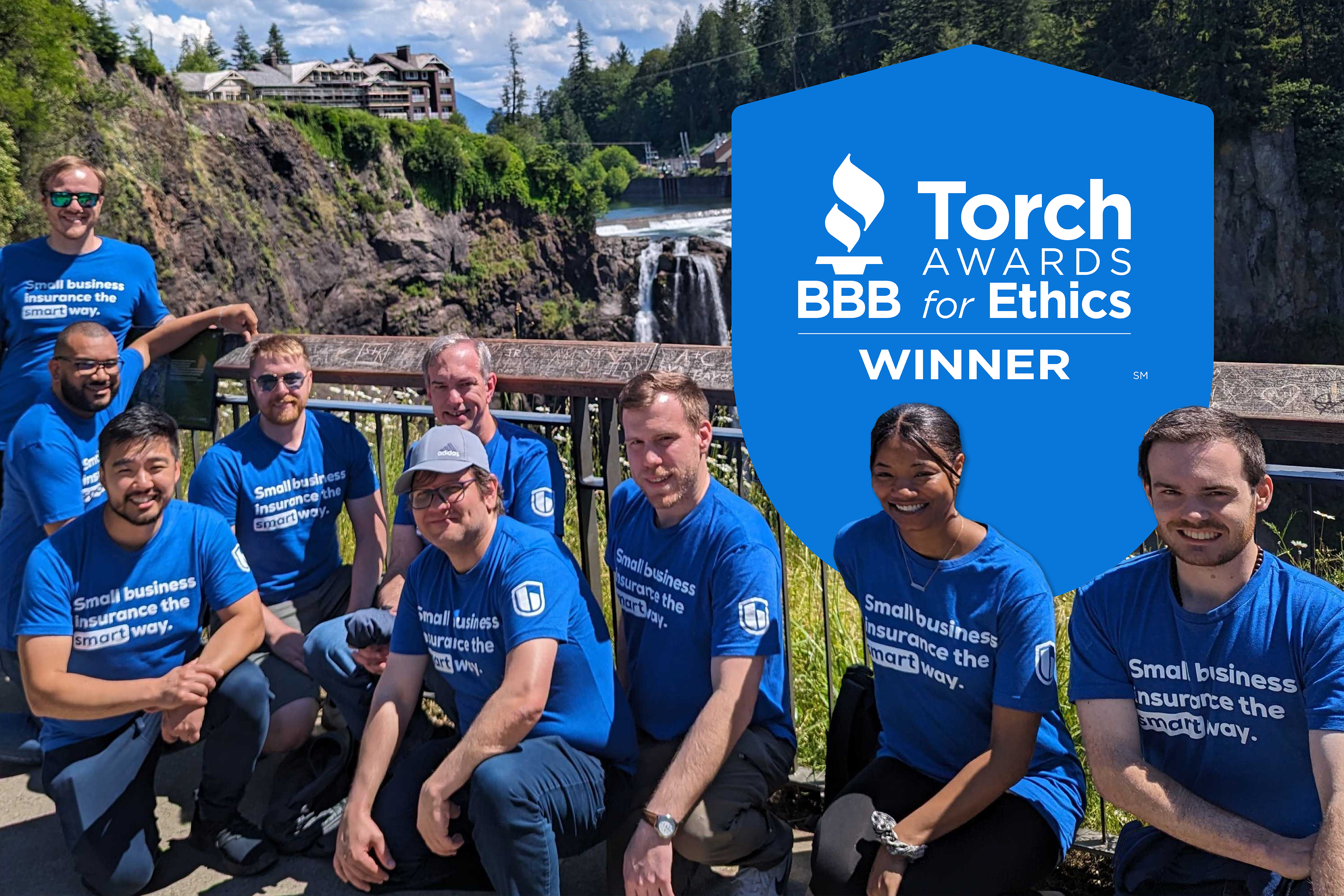 biBerk employees pose for a picture